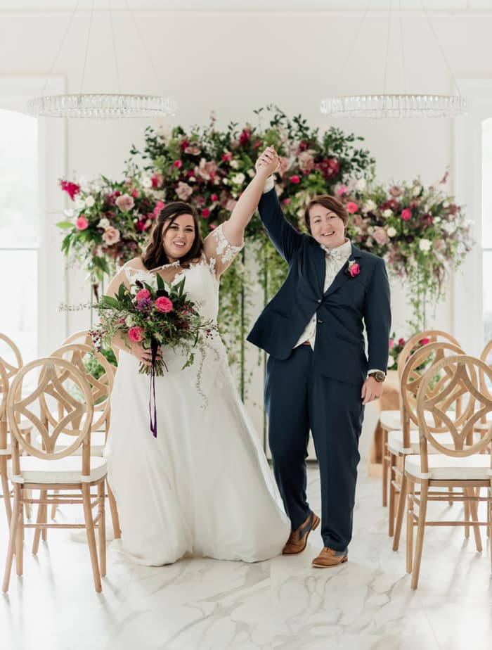 The Colonial Inn wedding ceremony with florals and grace chairs
