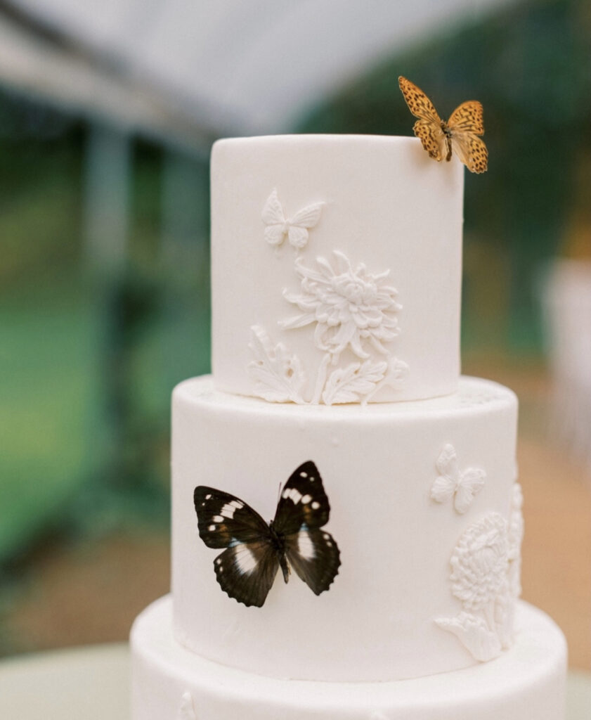white wedding cake with butterflies