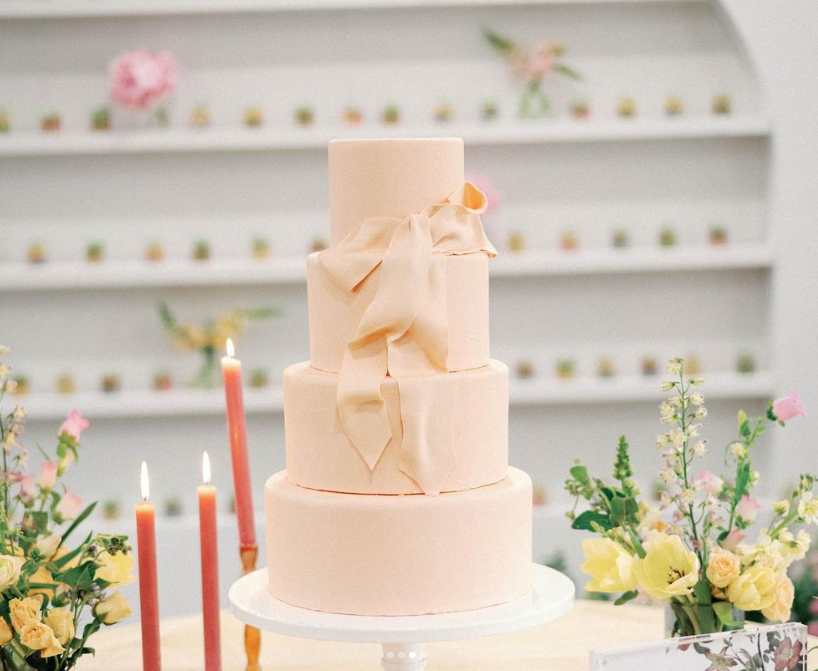 soft pastel coral 4 tier wedding cake